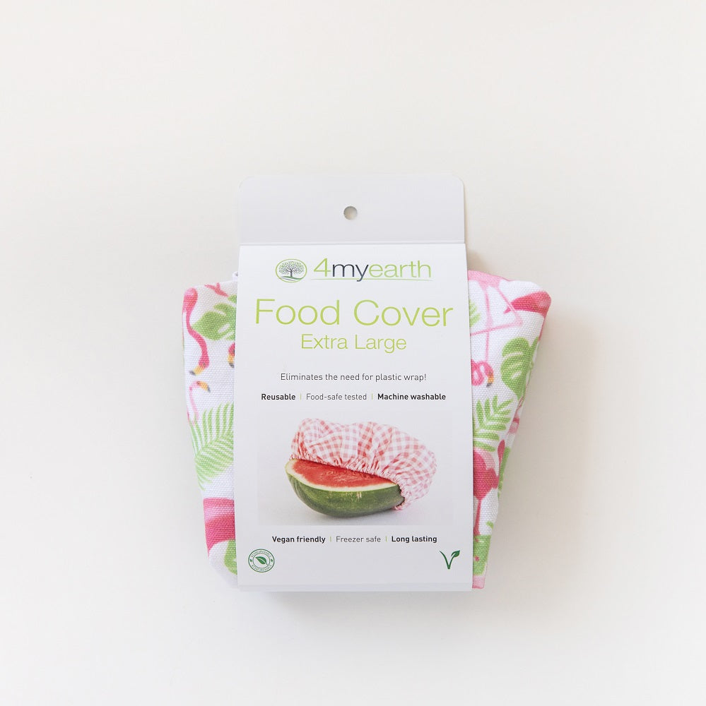 4MyEarth Food Cover XL covering a cut watermelon in Flamingoes print