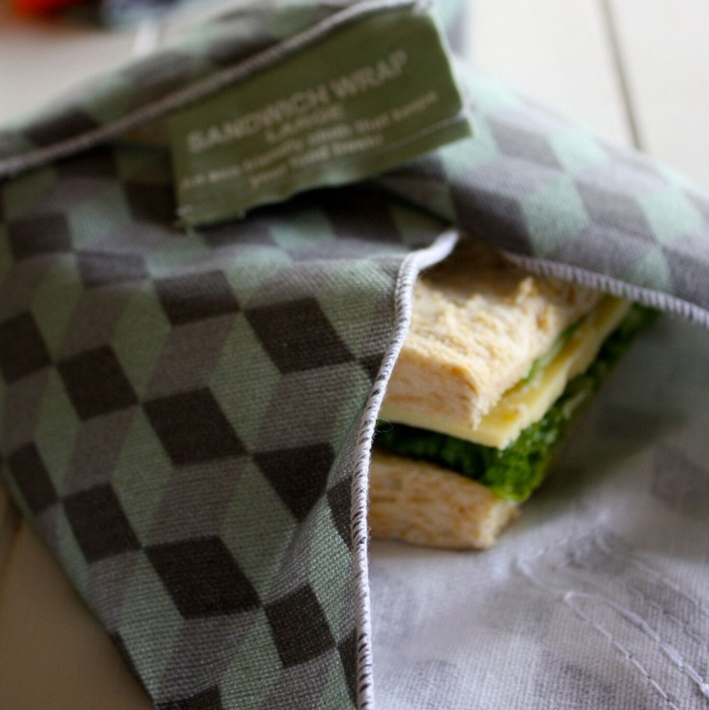 4MyEarth Sandwich Wrap in Geo print with a cheese sandwich